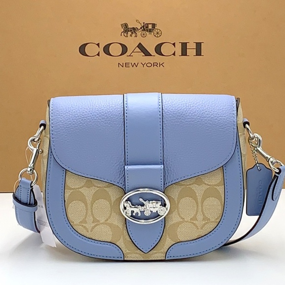 COACH Georgie Saddle Bag In Signat Canvas COLOR:
Silver/Light Khaki/Marble Blue